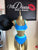 Two-piece swimsuit, high waist, sporty style, scoop neck and color block design.