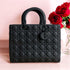 Matte Elegance Tote – Quilted Black Handbag with Charm Accent