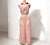 Full-body view of pink two-piece set on mannequin – elegant and relaxed fit