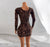 Leopard print dress on a mannequin against a white background